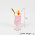 Pink ice cream fruit tea cup keychain with white cream, red cherry and size info - Light Pink