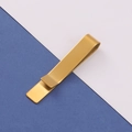 Detailed close-up of a minimalist golden stainless steel tie clip with a mirror finish - Mirror Gold Tie Clip