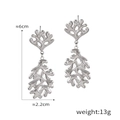 Zilveren geometrische koraalblad oorbellen van gepolijst titanium staal 6cm lang - Koraaltak Stijl / Zilver