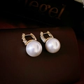 Detailed macro view of elegant pearl hoop earrings with gold plating and sparkling zircon - Real Gold Plated Ear Buckle / White