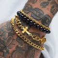 4-piece men's bracelet set with golden cross pendant and black beads on tattooed arm - Cross Beaded 4-Piece Set / Gold