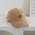 Detailed view of khaki cotton twill baseball cap with red smiley face embroidery - Kids One Size / Khaki