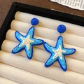 Handcrafted blue woven starfish drop earrings for women in a beige velvet jewelry box - Woven Star Style (HE24971) / Blue