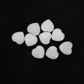Set of nine white translucent heart-shaped natural crystal stones for decoration - White Jade
