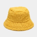 Close-up of bright yellow sherpa bucket hat with thick fleece texture for winter warmth - M (56-58cm) / Yellow