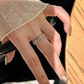 Silver hollow-out enamel butterfly ring with sparkling rhinestones worn on finger - Diamond Hollow