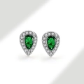 Macro detail of teardrop green zircon halo stud earrings in 925 sterling silver - 925 Silver / Emerald Green (May)