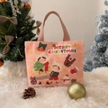 Pink Christmas canvas tote bag featuring cartoon reindeer and snowman festive patterns - Warm Winter Christmas