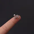 16g stainless steel cartilage stud with silver zirconia ring and fish tail detail - Silver Hollow Round Fishtail Style (354-16#S)