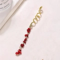Boho golden spiral hair ring with natural red stone pendant on textured background - Wine Red Long E9105