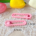 Pink wavy hair clip with dimensions of 5.9cm in length and 1.8cm in height - Light Pink