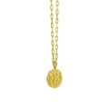 Detail of gold zodiac pendant with dual silhouettes and a small diamond on oval link chain - Gemini