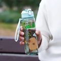Light green cartoon water bottle with blue strap and cute bear prints for kids - Transparent Green