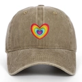 Close-up of rainbow heart embroidery on washed cotton khaki baseball cap details - One Size / Khaki
