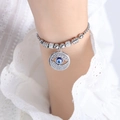 Silver beaded evil eye charm bracelet with sparkling crystals for a bohemian look - E452-Steel Color Bracelet