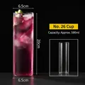 Tall 590ml glass highball tumbler for cocktails with purple drink and lime garnish - Style 26 Juice Glass