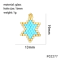 Macro shot of 19mm handmade blue and gold star pendant with glass bead weaving details - Light Blue (Star)