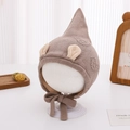 Detail of baby winter pointed knit hat with ears and secure chin ties in brown - 3-12 Months / Brown