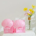 Pink inflatable arm bands for kids featuring white shell patterns for swimming safety - Pink Shell Arm Bands
