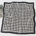 Polka dot silk scarf with striped border showing soft texture on a white surface - 70*70cm / White Background Polka Dots