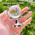 Mini rotating crystal globe with metal stand for modern desk decor and student gift - Silver
