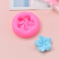 Macro detail of a bright pink five-petal flower silicone mold with a blue resin casting - Five-Petal Flower Style (2)