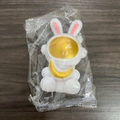 White astronaut bunny night light toy with gold visor in clear plastic packaging - Small Star Rabbit Gold Moon