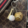 Three-piece baseball keychain set featuring a mini wooden bat, glove, and ball on a bag - 2CM Short Bat White Ball Khaki Glove