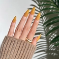 French ginger yellow press on nails with gold glitter tips in long almond shape - Mustard Yellow Gradient Gold Glitter Tip (JP1755)