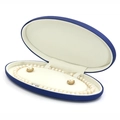 Dunkelblaue ovale Schmuckschatulle mit weißer Perlenkette und Ohrringen aus PU-Leder - Blaue Halskettenschachtel