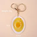 Portachiavi in miniatura zuppa di uova con chiusura dorata, misura 6cm x 4,5cm - Piatto Ovale - Uovo Alla Coque / Chiusura Dorata a Forma di 8