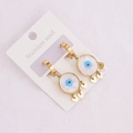 Detailed close-up of golden stainless steel evil eye earrings with heart pendants - Evil Eye Heart Pendant Style (7#)