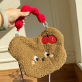 Detail of plush brown bear handbag featuring embroidered cherry patterns and red wavy handles - Bear Apple Style (Brown)