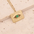 Macro shot of gold Evil Eye rectangle pendant with green gemstone on stone background - Green Gemstone Rectangular Style (5#)