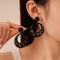 Detailed view of leopard print flocking earrings with matte black sphere stud - Leopard Flocked Hollow Round Drop Earrings (Silver Earring Post)