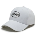 Cappellino da baseball in cotone bianco con ricamo NEAR nero e classica visiera curva - Regolabile / Bianco