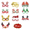 Close-up of 10 piece Christmas party glasses set with glitter reindeer and tree designs - 10-Piece Christmas Glasses Set