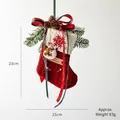 Red knitted Christmas stocking with snowman plush, pine cones and snowflake embroidery - Snowman Design