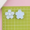 Light blue resin cherry blossom DIY charms with star center for phone cases - Blue with White Core