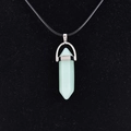 Light green quartz point pendant necklace with silver metal clasp on black cord - Synthetic Light Green Jade