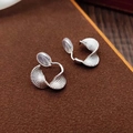 Elegant silver twisted spiral clip-on earrings with textured finish and silicone pads - Silver Spiral Textured Ear Clip
