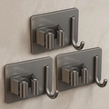 Trois supports à balais gris fusil avec pinces à rouleaux et crochets sur mur marbre - Support De Serpillière En Acier Inoxydable 304 Avec Crochet - Gris Gunmetal *3