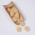 Realistic walnut-shaped PVC grain model in natural beige on a bamboo tray stand - Peeled Walnut Kernels (500g)