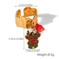 Détail d'une bague en acier doré avec pendentif renne et perle pour Noël - Style Renne et Cœur (HC-R30669)