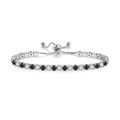 Detail of adjustable silver tennis bracelet featuring alternating black and white cubic zirconia - 4mm White Gold Round White + Black Stones