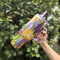 40oz insulated stainless steel tumbler with colorful floral pattern and purple handle - 40oz / Wisteria Garden