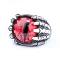 Macro view of gothic punk ring featuring a red demon eye set in silver steel claws - US 7 / Red (20106)