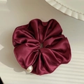 Elegant red satin scrunchie with a single pearl accent for high-end ponytail styling - Blush