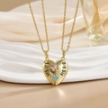 Golden split heart pendant necklaces with Lil Sis Big Sis text and butterfly detail - Sisters Heart Stitching