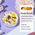 Orange blossom scented soy wax candle with gold flakes and dried botanicals in round glass - Dried Flower Glitter / Yellow / Orange Floral